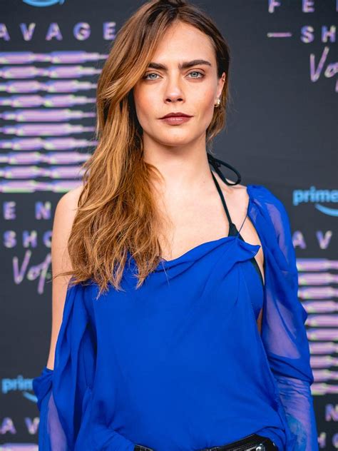 Cara Delevingne poses for new topless Pride campaign